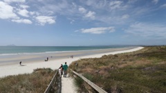 Northland had a sunny start to summer with many taking to the beaches. However, the year is expected to end on a wet note. Photo / Michael Cunningham.