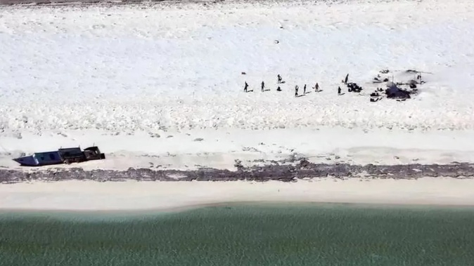 Crew of one of the two boats grounded on Bedwell Island, WA. Photo / Australian Maritime Safety Authority
