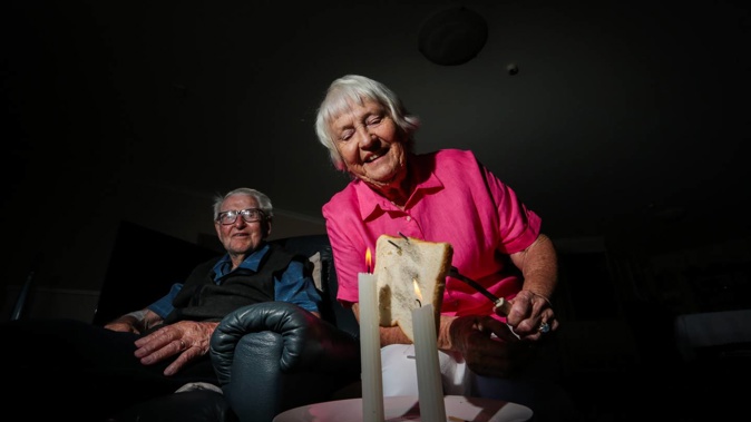 Ruth and Noel Dymond, 91 and 97 on West Quay in Ahuriri, Napier, satisfied their toast cravings with a candle cook-up. Photo / Paul Taylor