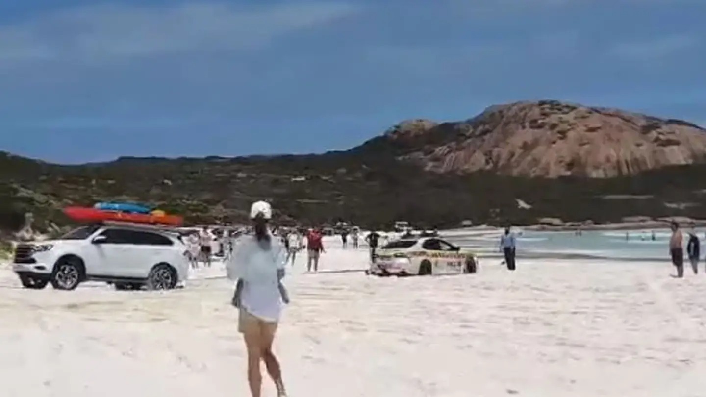 A white 4WD could be seen tugging the police car – a Toyota Camry – to safety. Photo / Facebook; Bogged