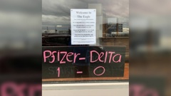 A Bluff pub is in hot water for putting a sign up on their window that compares Ardern and Bloomfield to Hitler and Goebbels and Covid response to Nazi Jewish atrocities. (Photo / Marcus Lush / Twitter)