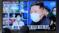People watch a TV screen showing a news program reporting with an image of North Korean leader Kim Jong Un, at a train station in Seoul, South Korea. Photo / AP