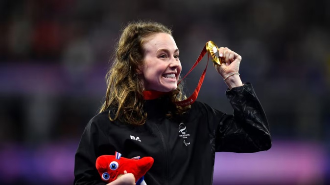 Gold medallist Anna Grimaldi of New Zealand celebrates during the medal presentation for the Women's 200m - T47 Final on day ten of the Paris 2024 Paralympic Games. Photo / Getty Images