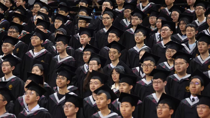 Chinese graduates face a tough job market requiring master's degrees for top jobs. Photo / the Washington Post