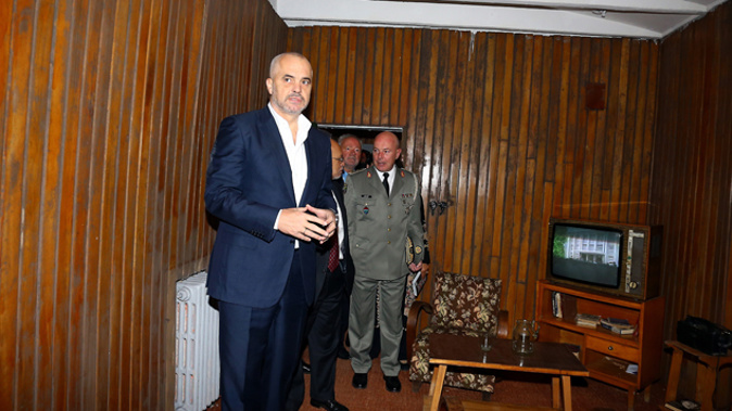 Albanian Prime Minister Edi Rama (L) visits a bunker built by late communist dictator Enver Hoxha in Tirana (Getty Images)