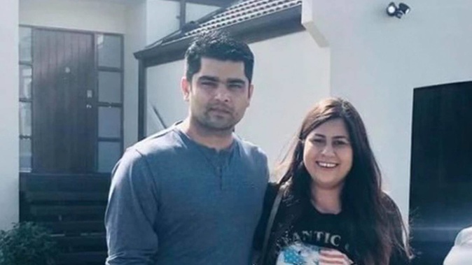Ameet Bhargav and his wife Renu outside their leaky house in Goodwood Heights, Manukau shortly after buying the property in 2020. Photos / Supplied