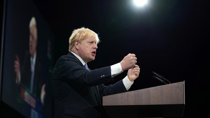 Britain's Prime Minister Boris Johnson makes his keynote speech at the Conservative party conference in Manchester, England, Wednesday, Oct. 6, 2021. (Photo / AP)