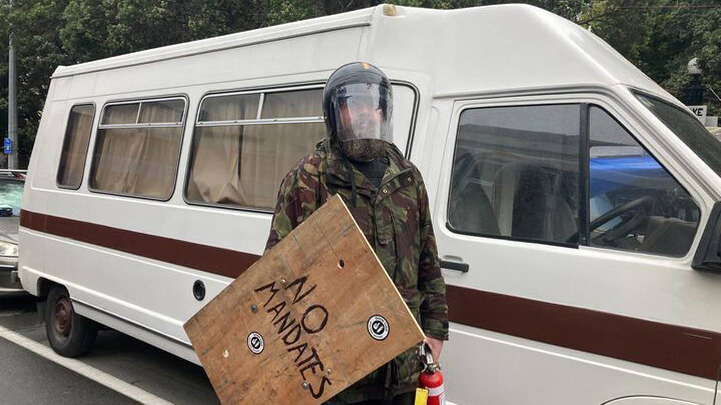 A protester with homemade shield. (Photo / NZH)