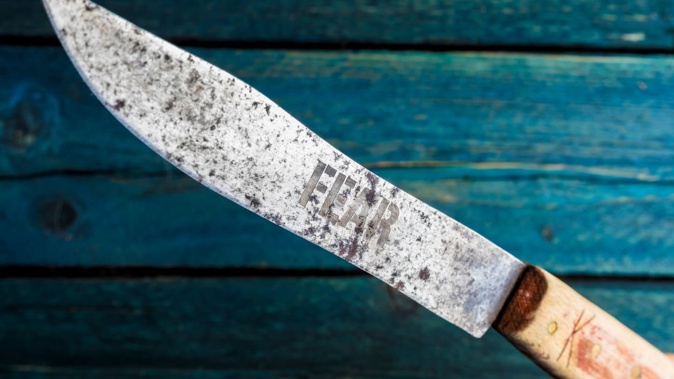 The offender threatened the woman with a machete as he tried to steal her car in a supermarket car park. (Image / 123rf)