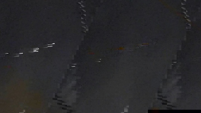 This image from video provided by Jaime Hernandez shows streaks of light travelling across the sky over Sacramento, California. Photo / AP