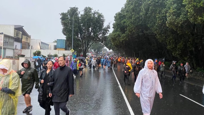 Dissappointed fans stream from Mt Smart Stadium as Elton John's concert is cancelled amid heavy downpours in the city. Photo / Alanah Eriksen
