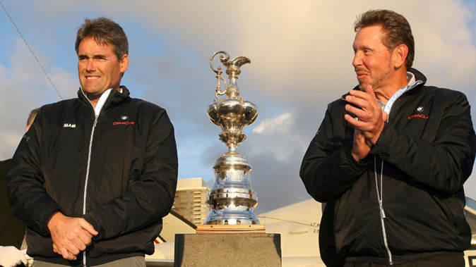 Russell Coutts and Larry Ellison with the America's Cup (Getty Images)