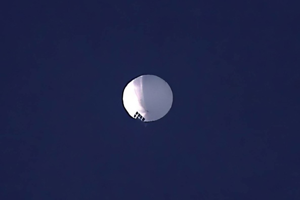 The huge, high-altitude Chinese balloon sailed across the US, drawing severe Pentagon accusations of spying and sending excited or alarmed Americans outside with binoculars. Photo / AP