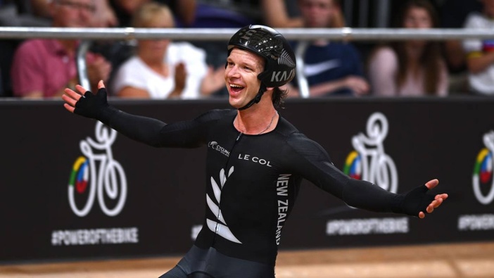 Aaron Gate celebrates at the finish line after winning the Points Race at the UCI Cycling World Championships in Glasgow. Photo / Getty