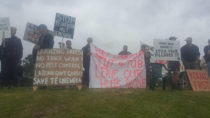 About 200 people gathered in Tāneatua this morning to protest the removal of Te Urewera Department of Conservation backcountry huts. Photo / supplied