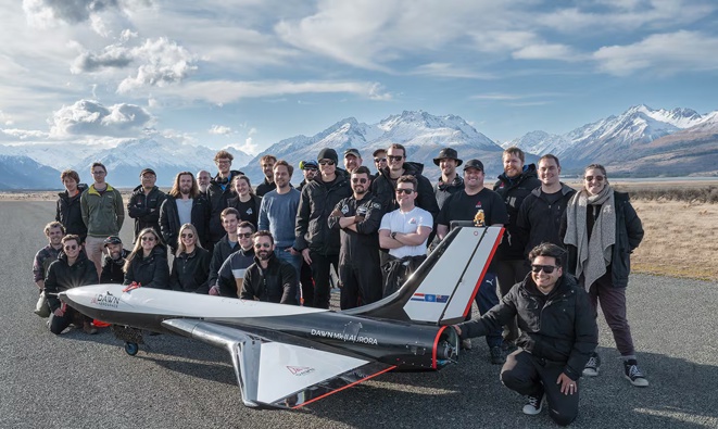 The Dawn Aerospace team with the Mk II Aurora at the Glentanner Aerodrome near the base of Aoraki Mt Cook.