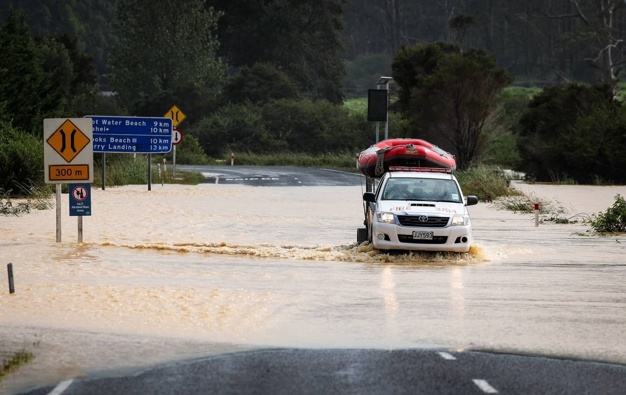 Flooding on the road to Hahei at Cook's Beach, Coromandel. Photo / Mike Scott