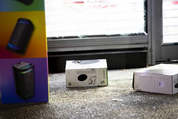 Burglars dropped Xbox consoles out front the store during the brazen smash and grab. Photo / Hayden Woodward