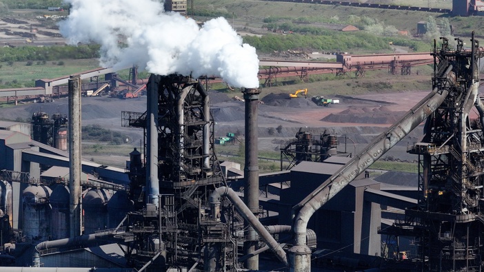 An aerial view of the blast furnaces and the iron ore stock yard behind at the British Steel Scunthorpe site on April 14, 2025 in Scunthorpe, England. (Photo by Christopher Furlong/Getty Images)