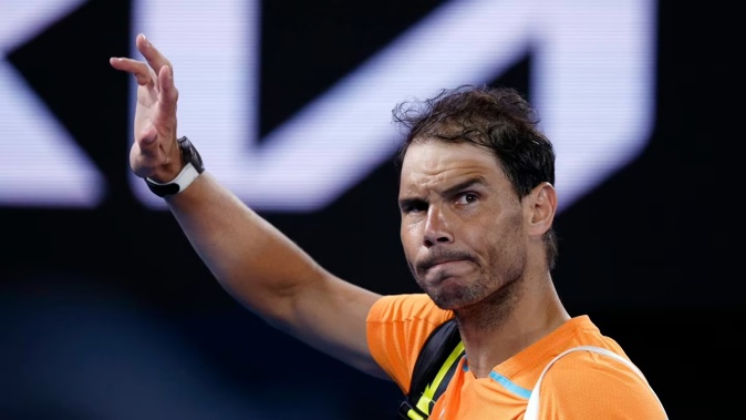 Rafael Nadal waves after a defeat at the Australian Open. Photo / AP