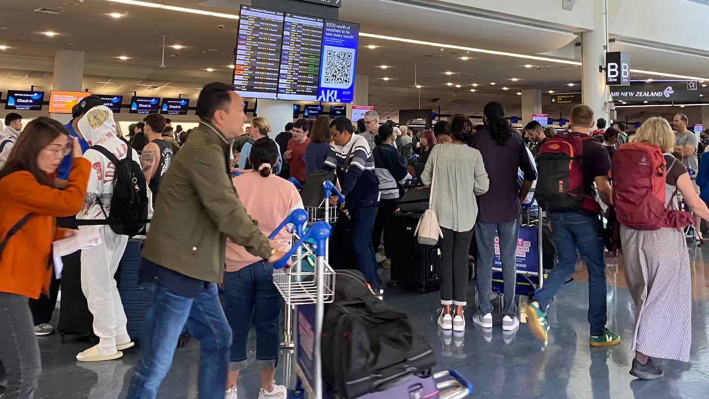 A technical issue at Auckland Airport is causing long delays.