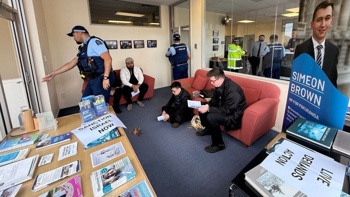 'Sanction Israel now': Christian Priests chain themselves to Nicola Willis' office