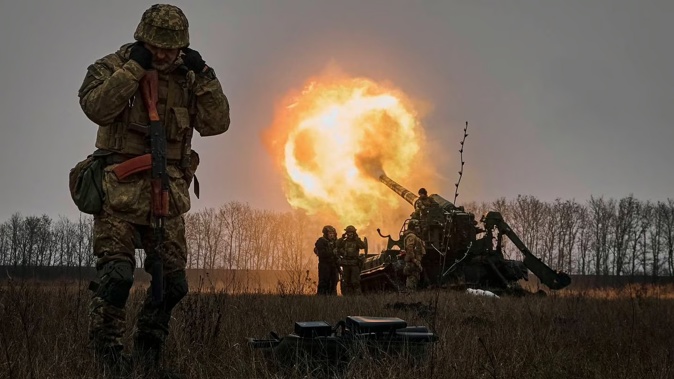 Ukrainian soldiers fire a Pion artillery system at Russian positions near Bakhmut, Donetsk region. Photo / Libkos, AP