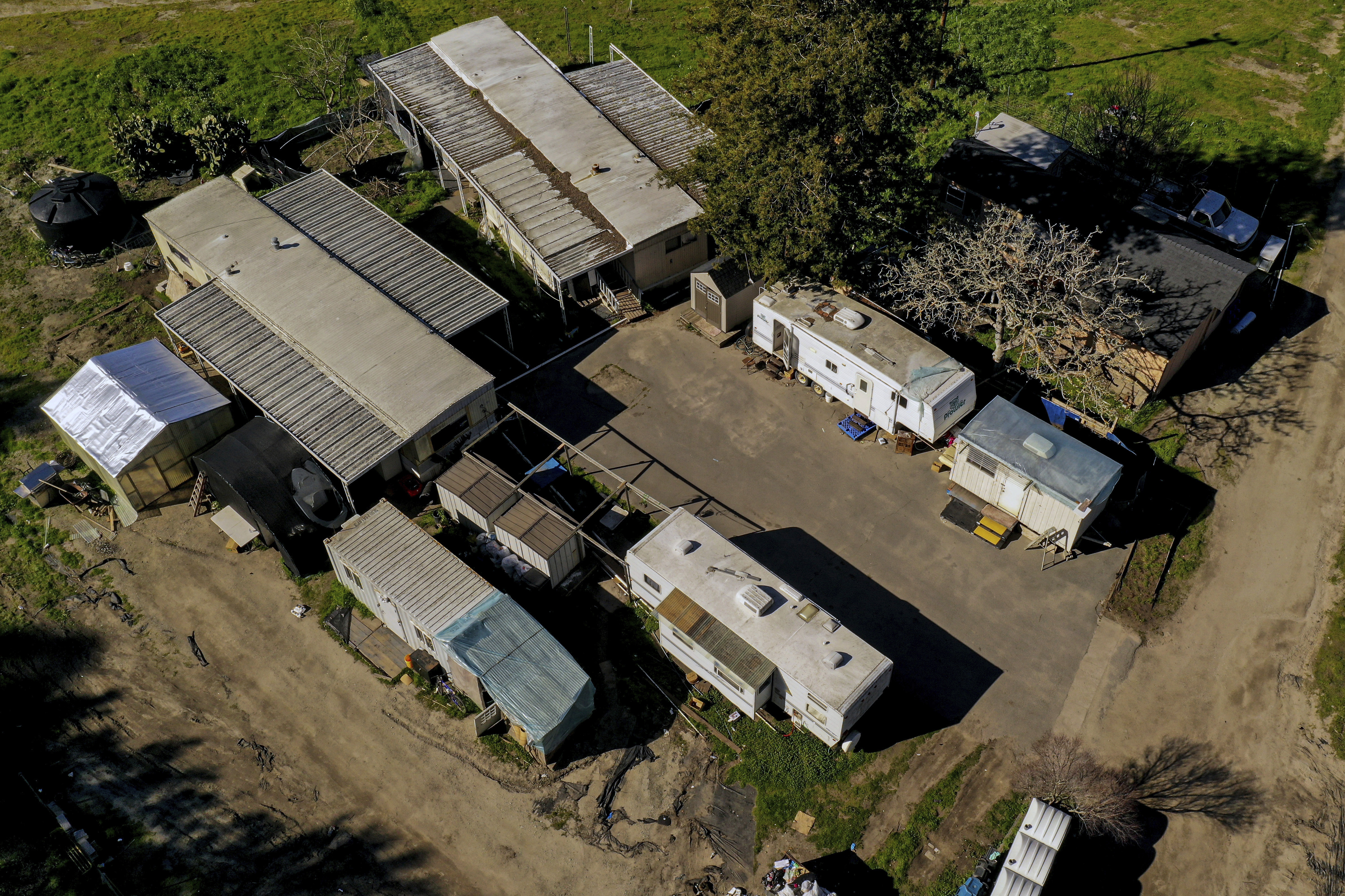 A farmworker accused of killing seven people in shootings at two Northern California mushroom farms, including this one, has been charged with seven counts of murder. Prosecutors filed the charges Wednesday. A court appearance for 66-year-old Chunli Zhao was postponed until Feb. 16. Photo / AP