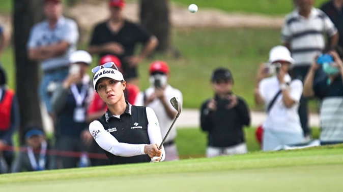 Lydia Ko of New Zealand watches her shot on the first hole during the first round of the LPGA Honda Thailand. Photo / AP