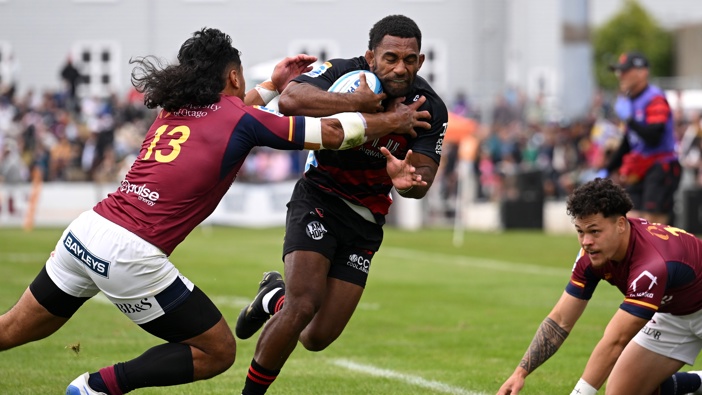 Sevu Reece of the Crusaders charges forward during the Super Rugby Trial Match between Highlanders and Crusaders at Rugby Park on February 06, 2025 in Invercargill, New Zealand. (Photo by Joe Allison/Getty Images)
