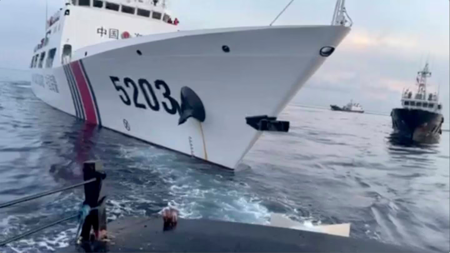 This image from a video released by the Armed Forces of the Philippines shows a Chinese coast guard ship with bow number 5203 after bumping a Filipino supply boat as they approached Second Thomas Shoal, locally called Ayungin Shoal, in the disputed South China Sea. Photo / AP