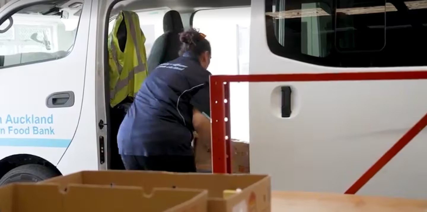 The South Auckland Christian Food Bank is packing around 140 food parcels a day. Photo / Alyse Wright