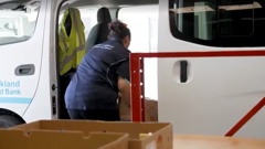 The South Auckland Christian Food Bank is packing around 140 food parcels a day. Photo / Alyse Wright