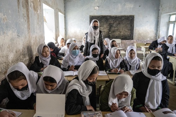 Afghan school girls attend their classroom on the first day of the new school year, in Kabul, Saturday, March 25, 2023. The new Afghan educational year started in Afghanistan, while high school remained closed for girls for the second year after Taliban returned to power in 2021. (AP Photo/Ebrahim Noroozi)