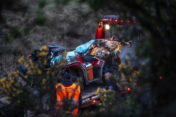 The quad bike used by Tom Phillips as a getaway vehicle before he engaged in a shootout with police, loaded with stolen goods. Photo / Hayden Woodward
