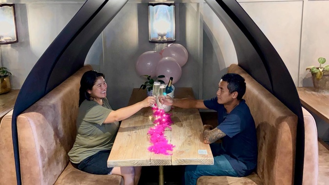 Head chef of Daisy Chang Jakrapun Imthongbai aka Chef Bong and his wife Kallaya Imthongbai (Lin) sit under the tent. Photo / Supplied