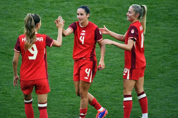 Canada players celebrate their Paris Olympics win over New Zealand. Photo / Photosport