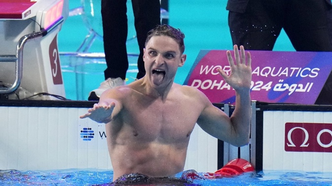 Lewis Clareburt of New Zealand reacts after winning the gold medal in the Men's 400m Individual Medley final at the World Aquatics Championships in Doha. Photo / AP