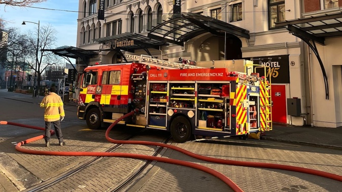 A small fire inside a Christchurch restaurant activated sprinklers which caused water to flood into a hotel below. Photo / Jazlyn Whales