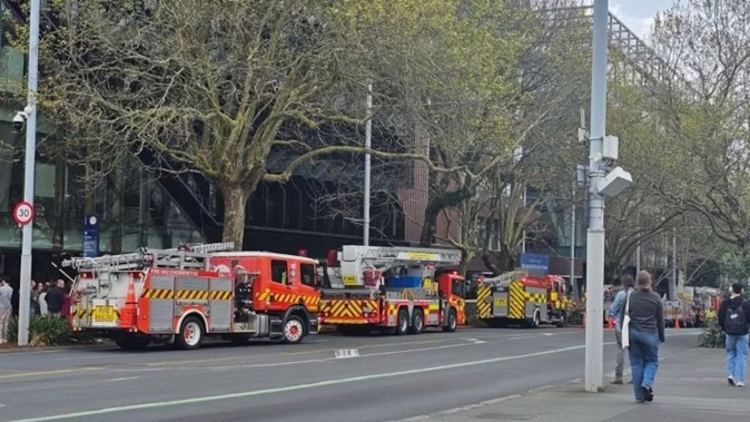 Multiple fire trucks are in attendance on Symonds St, outside Auckland University.
