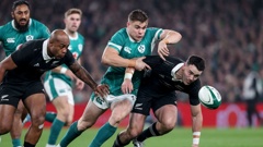 Ireland’s Garry Ringrose with All Blacks fullback Will Jordan chasing a loose ball. Photo / INPHO/Dan Sheridan
