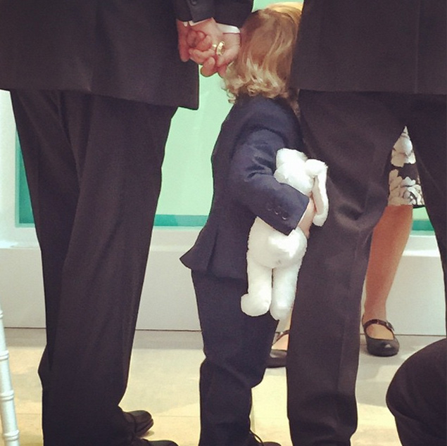 "Zachary grabs David's iPhone and takes a photo of his brother while we exchange our vows. #ShareTheLove"