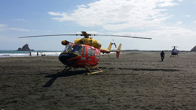 Police say a passing vessel is to thank for saving three boaties who were swamped by a freak wave on Auckland's Manukau Harbour bar (Photo: Newspix/NZ Herald)
