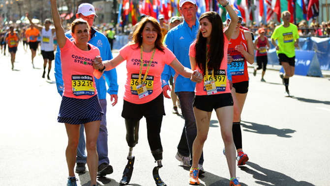 Boston marathon bombing survivors cross finish line (Getty Images)