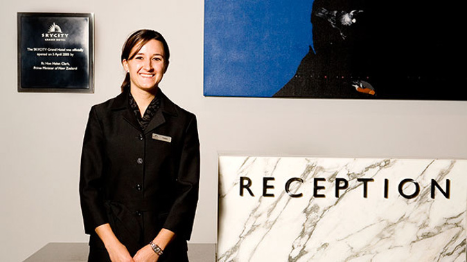 Kathrin Harpfer, guest services supervisor at the SkyCity Grand Hotel, wears a uniform designed by Kate Sylvester (NZME.)