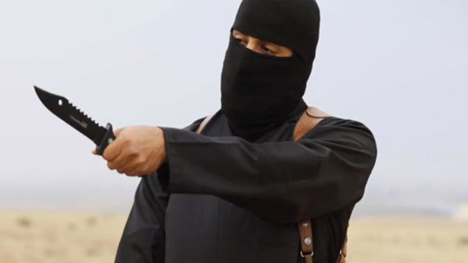 Mohammed Emwazi as he appears in ISIS propaganda videos (Supplied) 