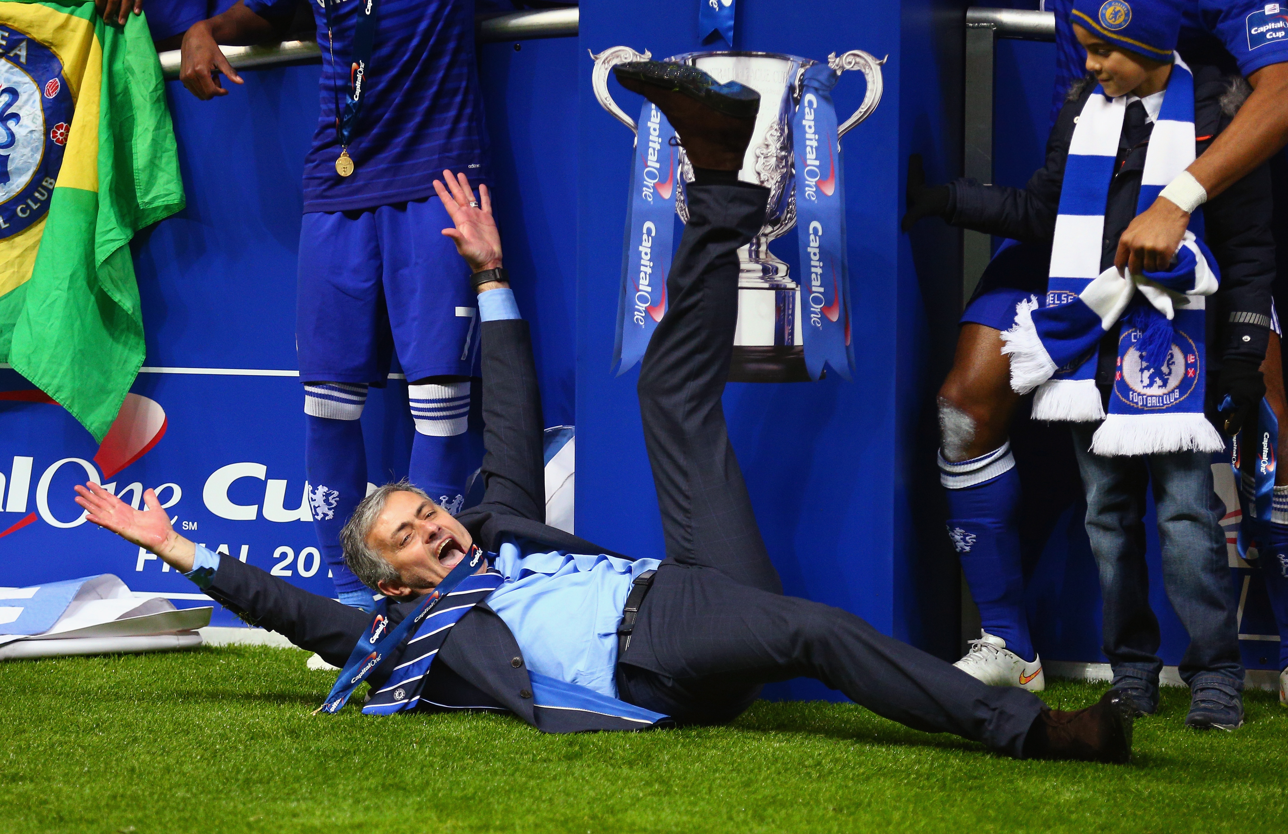 Manager Jose Mourinho of Chelsea on the pitch as Chelsea celebrate with the trophy during the Capital One Cup Final match between Chelsea and Tottenham Hotspur.