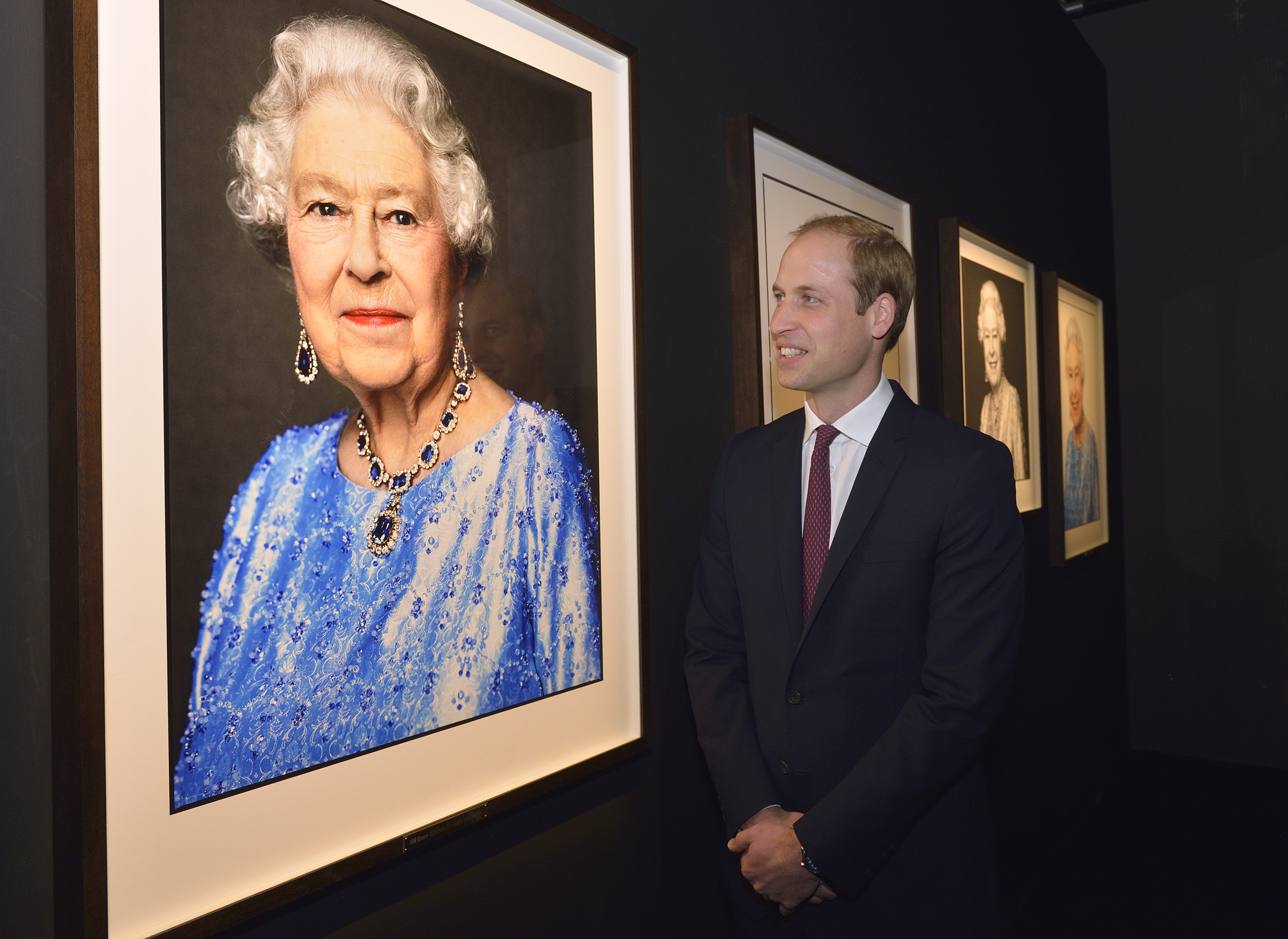 Prince William, Duke of Cambridge admires the David Bailey Portrait of the Queen as he visits the GREAT British Festival of Creativity on March 3, 2015 in Shanghai, China. 