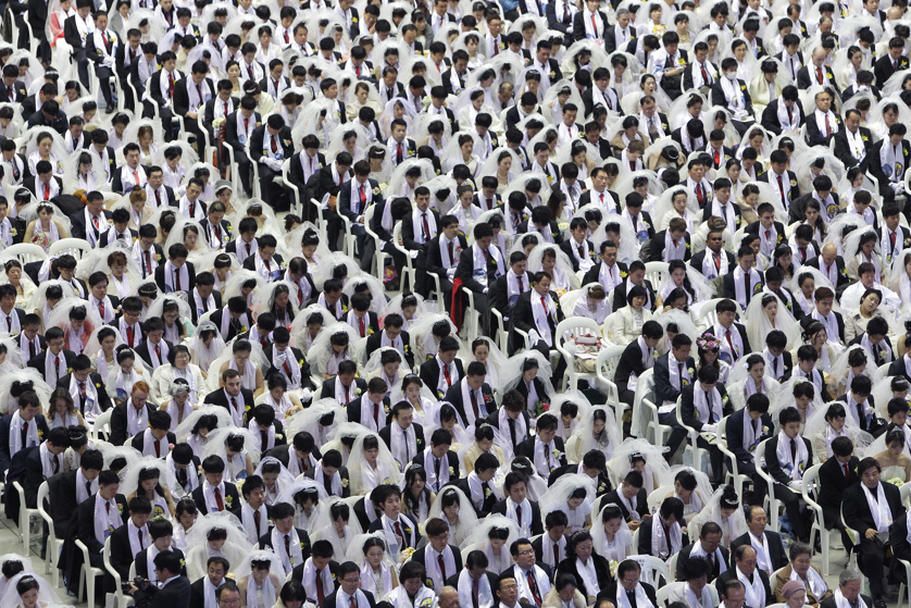 Thousands of couples take part in a mass wedding of the Family Federation for World Peace and Unification on March 3, 2015 in Gapyeong-gun, South Korea.
