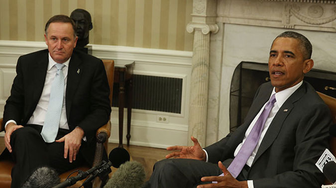 U.S. President Barack Obama (R) speaks during a meeting with New Zealand Prime Minister John Key in the Oval Office at the White House, June 20, 2014 in Washington. (Getty Images)